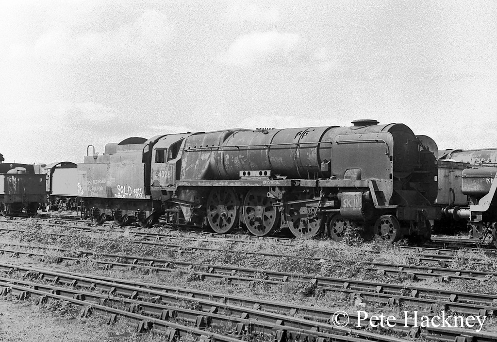34028 Eddystone in Woodham's scrapyard at Barry - 1975.jpg