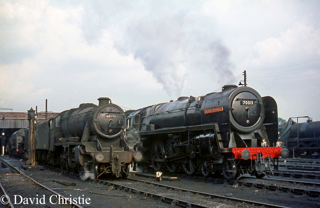 70013 Oliver Cromwell on Lostock Hall shed next to 8F class 48493 - 4th August 1968 .jpg