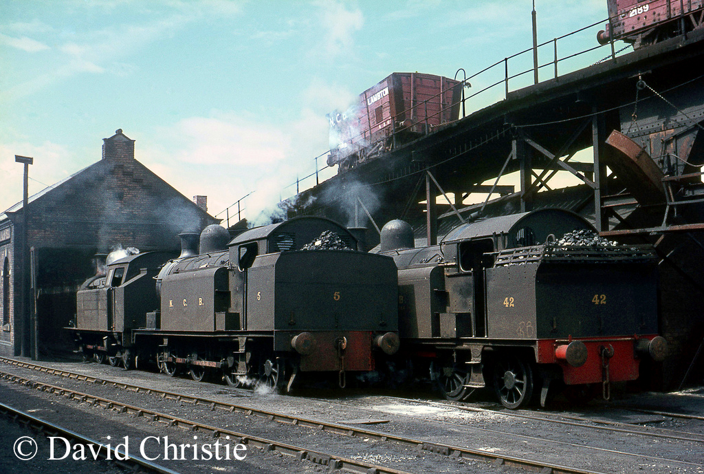 Robert Stephenson & Hawthorn Works No 3377 (No 5) at NCB's Philadelphia shed in the centre..jpg